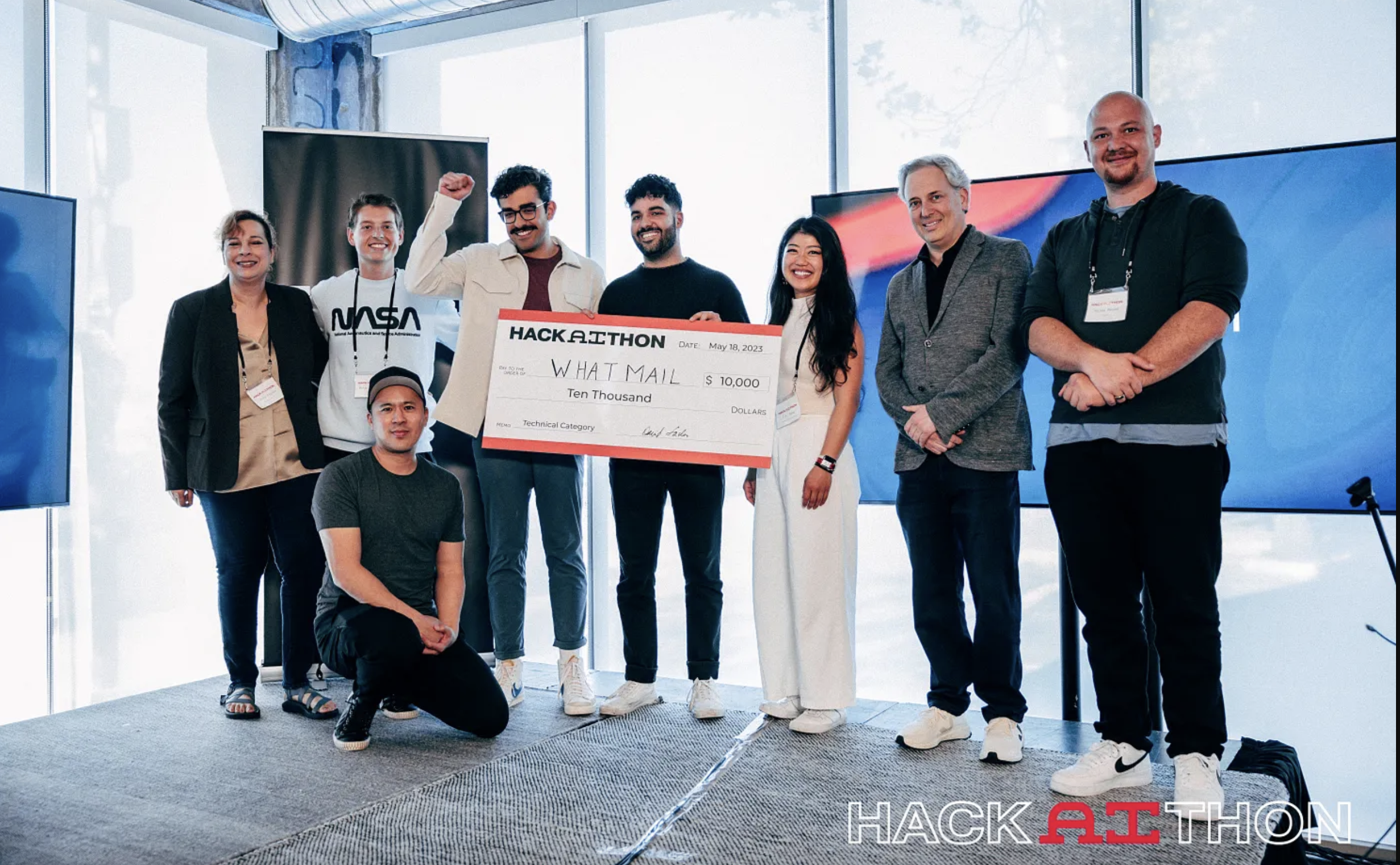 I’ve been a Hackathon Judge Several Times in 2023, Kneeling in foreground at the Craft Ventures HackAIthon in May 2023. SF, awarding the winner.